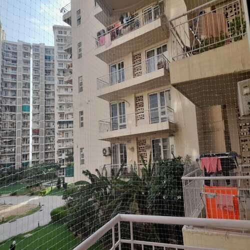 transparent pigeon net in L shape balcony